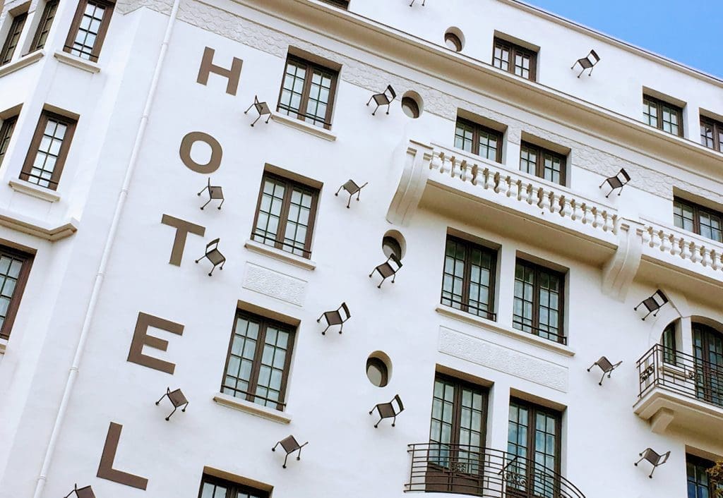 Lyon murals: chairs painted on a hotel