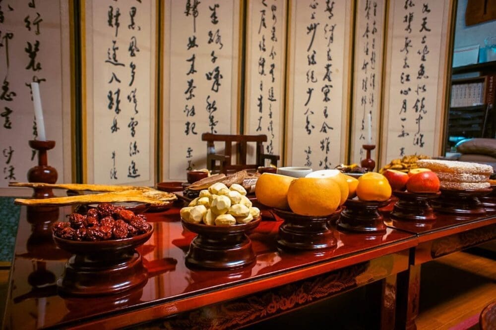 Seollal | 7 Cool Korean Lunar New Year Traditions to Know About 8 seollal | charye table set up with traditional korean foods