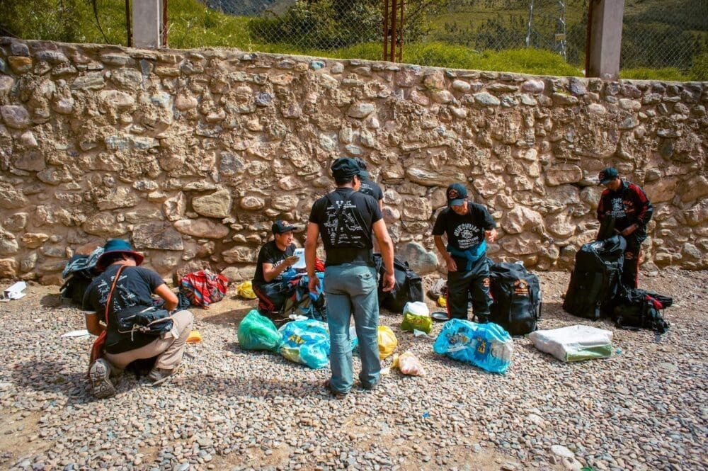 The Inca Trail Hike to Machu Picchu AKA "Dead Woman in the Pass at 4200 Metres" 4 porters from quechuas expeditions preparing in ollaytaytambo peru